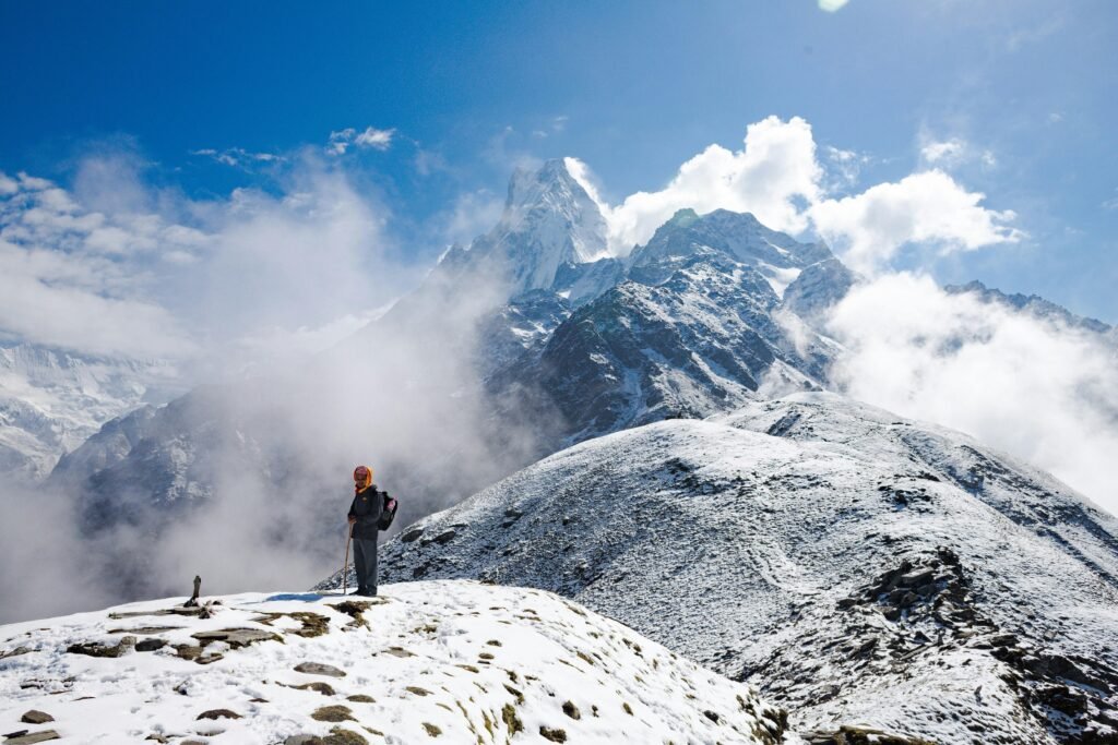 Adventurous traveler overlooking a stunning international landscape, embodying the spirit of affordable travel and exploring budget-friendly countries.