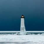 Buffalo travel ban update: Snow-covered roads and severe winter weather conditions, illustrating dangerous travel and the importance of safety advisories.