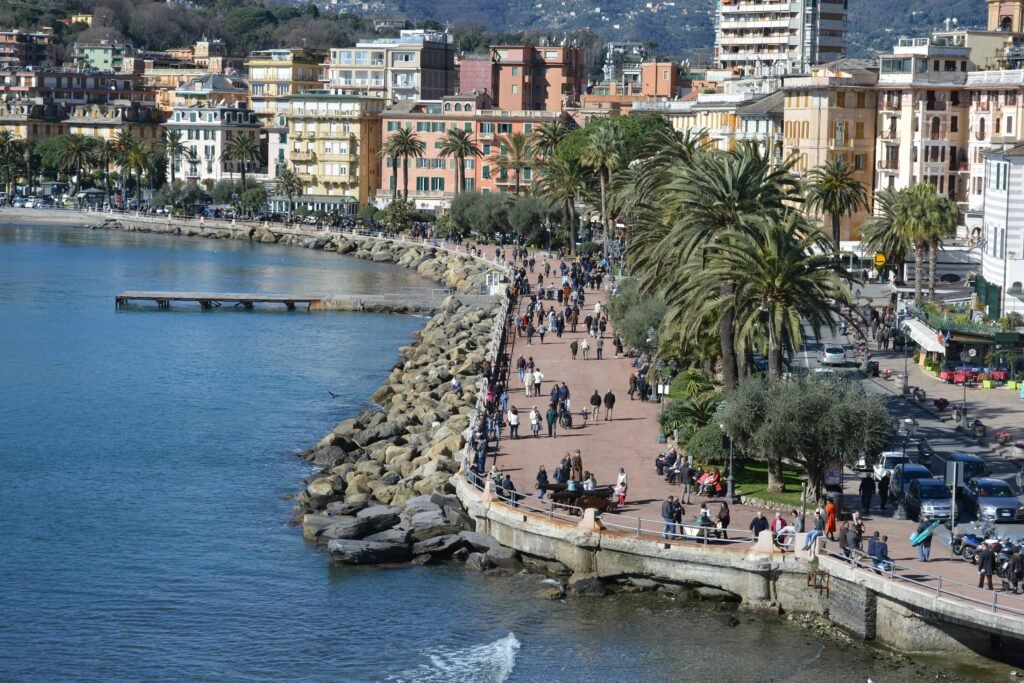 Vibrant coastal town scene with people enjoying a balanced beach lifestyle, illustrating the best beach towns to live in.