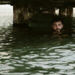Person discovering a unique local hidden gem or cool destination nearby, perfect for a spontaneous day trip or weekend getaway exploration.