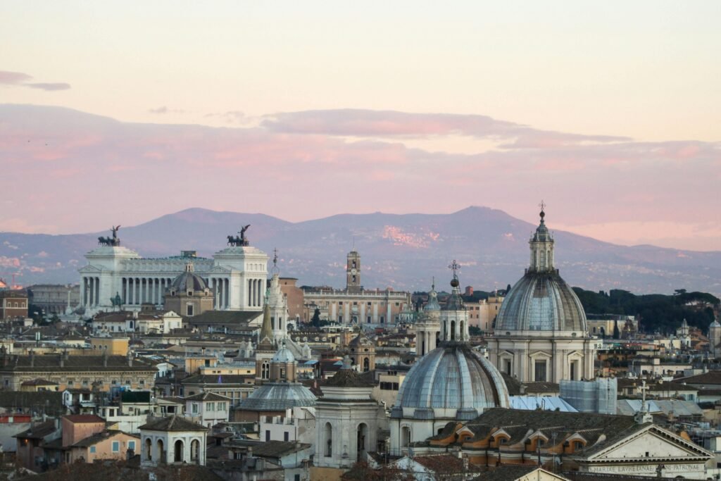 A vibrant travel montage showcasing some of the good countries to visit in Europe for a 2025 holiday, featuring a mix of historic cities, sunny coastlines, and natural wonders.