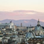 A vibrant travel montage showcasing some of the good countries to visit in Europe for a 2025 holiday, featuring a mix of historic cities, sunny coastlines, and natural wonders.