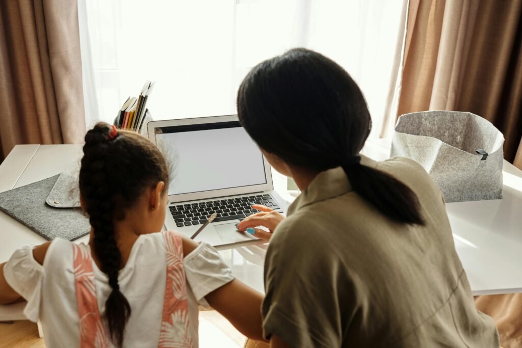 Parent and student using Infinite Campus Sequoia online portal to check grades and academic information.