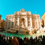 A massive crowd of tourists packs a famous European city square, illustrating the findings on Europe's most overcrowded tourist spots revealed by a new study.