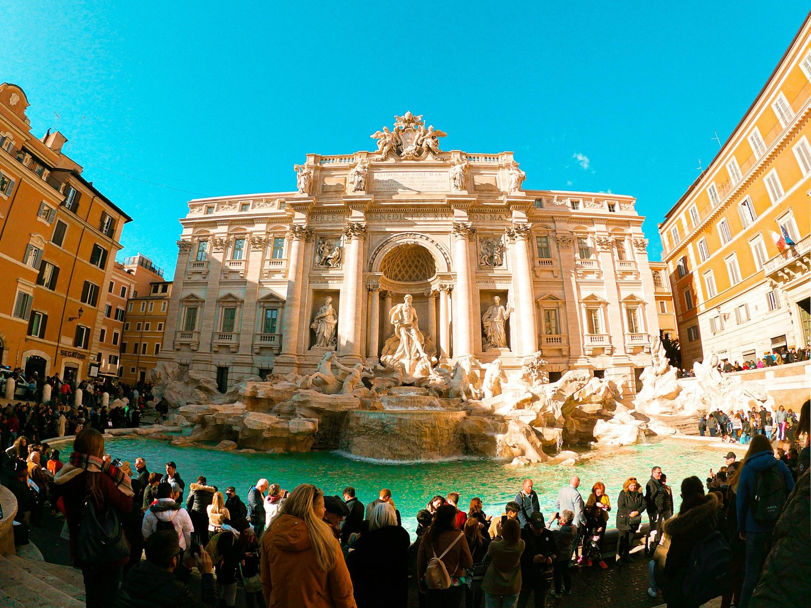 A massive crowd of tourists packs a famous European city square, illustrating the findings on Europe's most overcrowded tourist spots revealed by a new study.