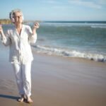 Happy senior woman enjoying a stress-free solo travel tour with companions, discovering new horizons safely.