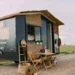 High-quality modern travel trailer parked in a picturesque natural setting, symbolizing the best RV brands for memorable road trips, luxurious camping, and family adventures.